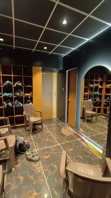 Locker area with open storage cubbies and seating